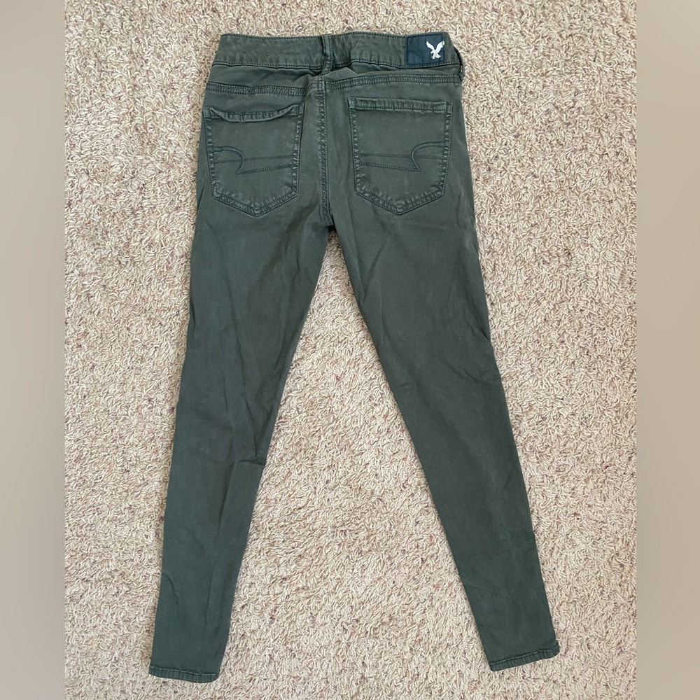 American Eagle Distressed Green Jeggings size 2